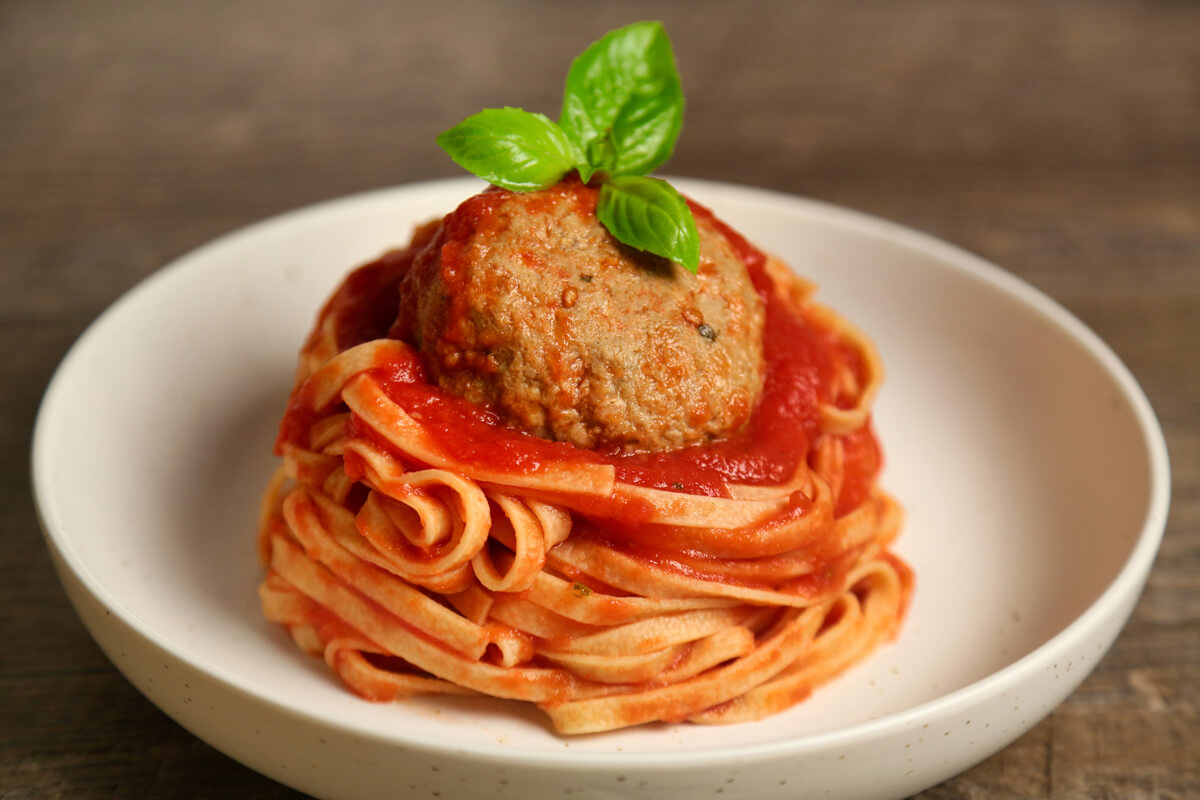 A simple classic with an artisan twist! To make our meatballs we start from scratch and use only the finest ingredients. We begin by grinding our own cheese and baking our own bread (using just our semolina and yeast) to make our own breadcrumbs. When we say no preservatives, we mean it, even if that means added steps and effort in our cooking process. Our well seasoned Italian meatballs are incredibly tender and served with our signature tomato sauce.