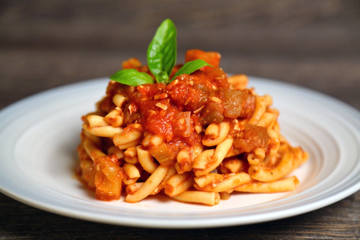 In Italian, the word casereccio means homemade. Casarecce is traditionally made by wrapping the pasta around a thin rod known as a 