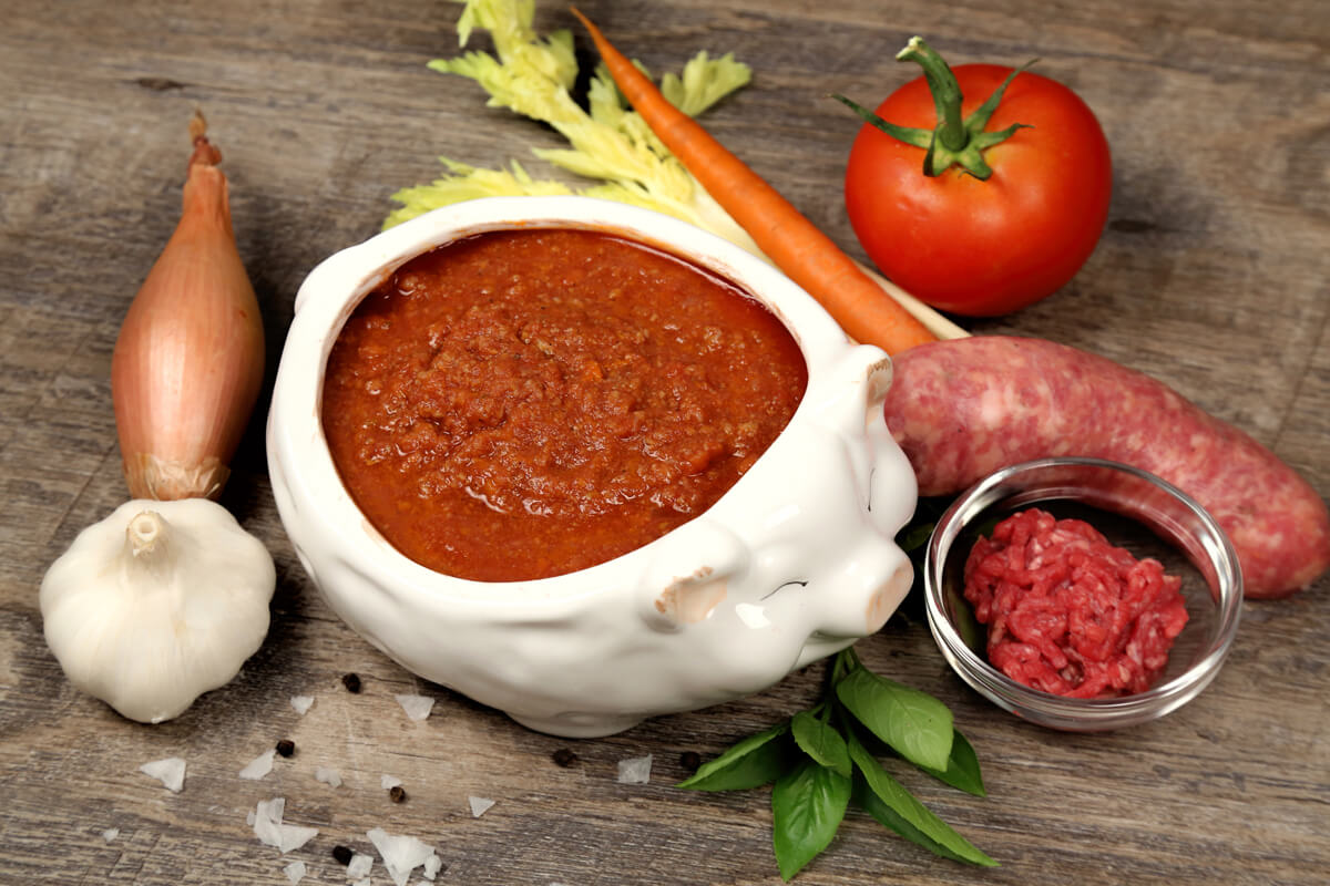 Developing robust flavors takes time, but cooking our traditional bolognese sauce slowly allows each ingredient to stand out while creating the perfect texture. 