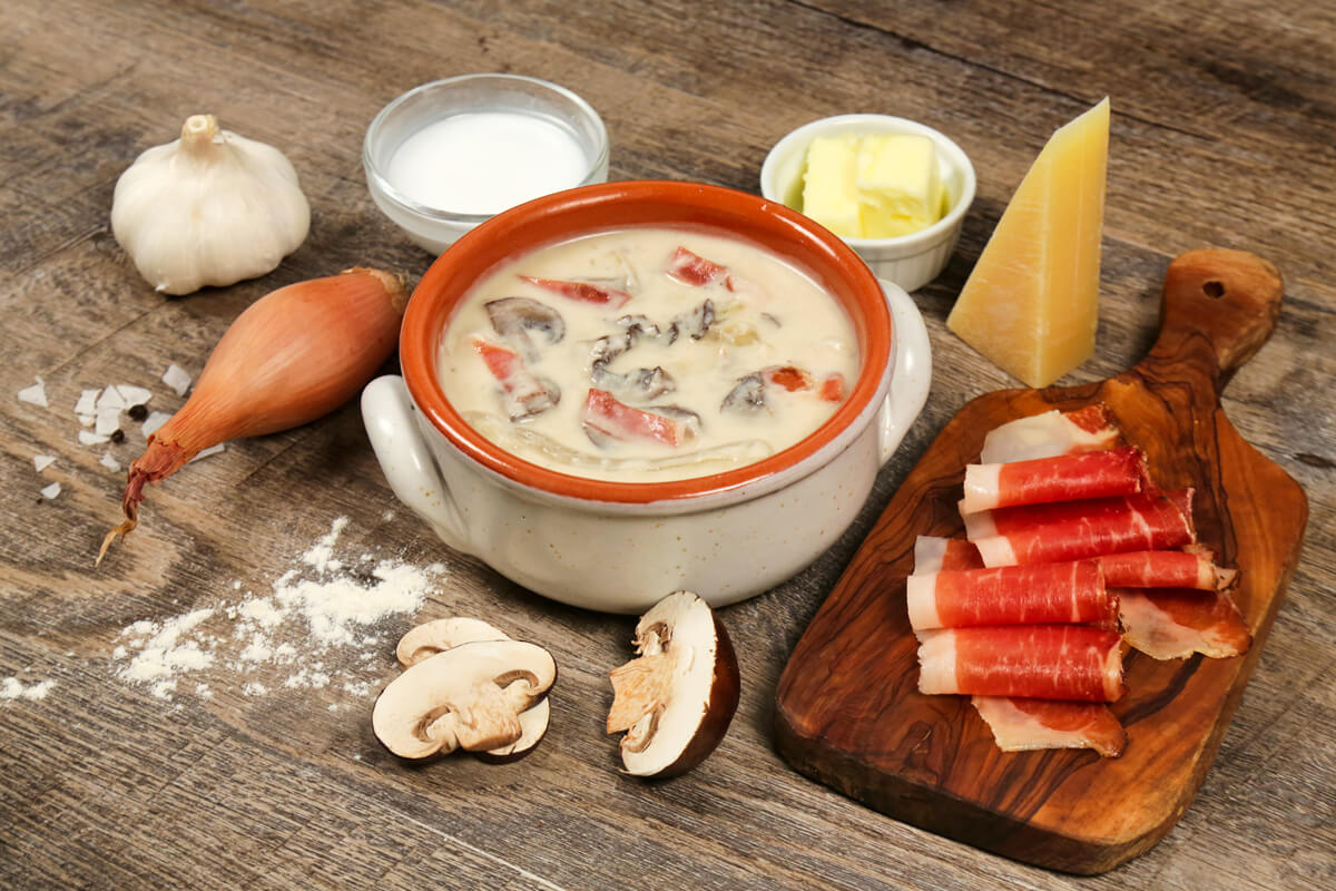This popular italian preparation of our traditional alfredo sauce starts with speck, a smoked and cured ham that originates from the north of Italy. Speck and sauteed mushrooms are enveloped in our creamy Alfredo sauce for a unique dish that is sure to be a new favorite!